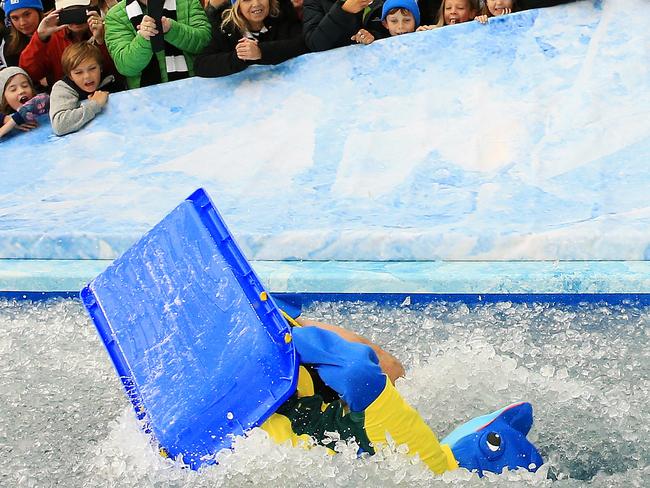 Cricket champ Adam Gilchrist hits the icy pool. Picture: Mark Stewart