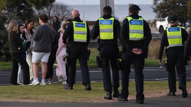 Police and PSOs patrol Rye Beach during schoolies. Picture: Josie Hayden