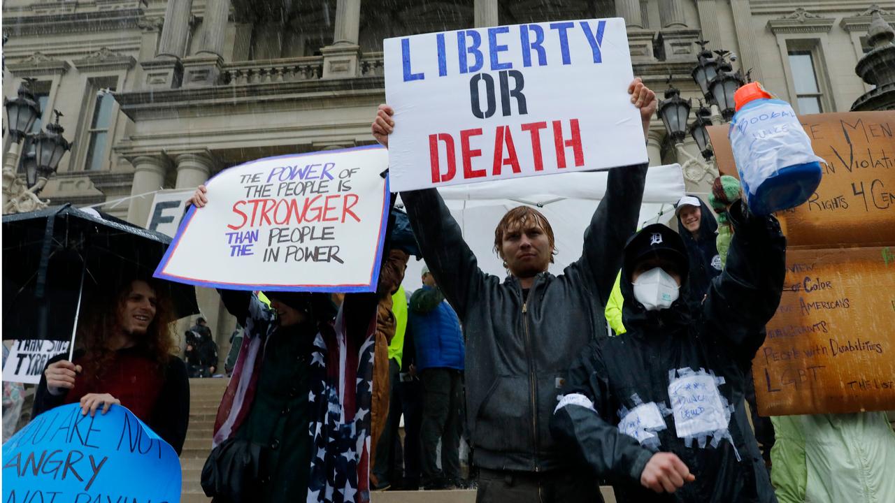 Demonstrators in Lansing, Michigan, protest the stay-at-home orders. Picture: AFP