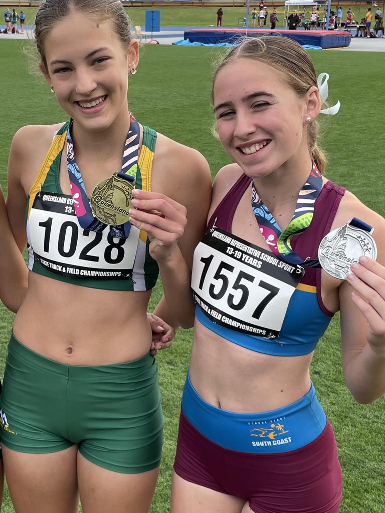 St Aidan's Anglican Girls' School sprint ace Eloise Nealon, with recent QRSS silver medallist, South Coast's Zarayah Williams.