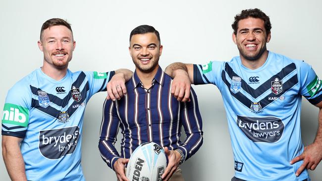 Great mates Damien Cook and Dale Finucane with singer Guy Sebastian. Picture: Tim Hunter