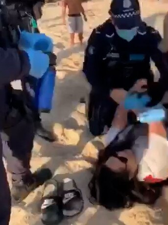 Police arrested a woman at Altona Beach.