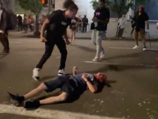 Man is knocked unconscious after being repeatedly punched and kicked by BLM protesters in Portland.