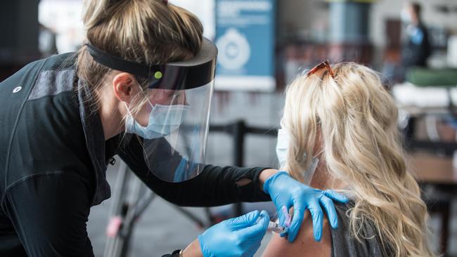 A woman receives the COVID-19 vaccine at Gillette Stadium, Massachusetts. Picture: Scott Eisen/Getty Images/AFP