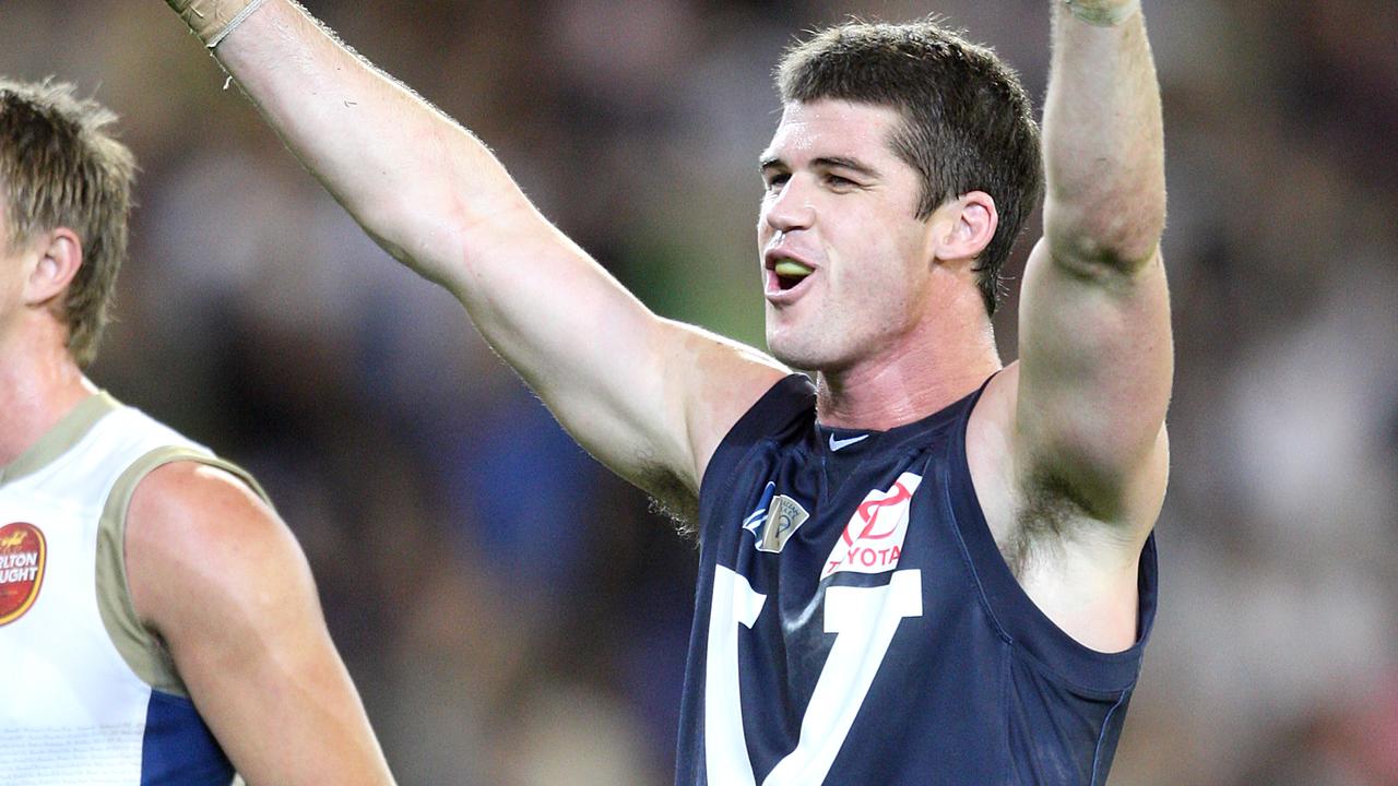 Jonathan Brown celebrates on the siren after winning the Hall of Fame tribute match in 2008.