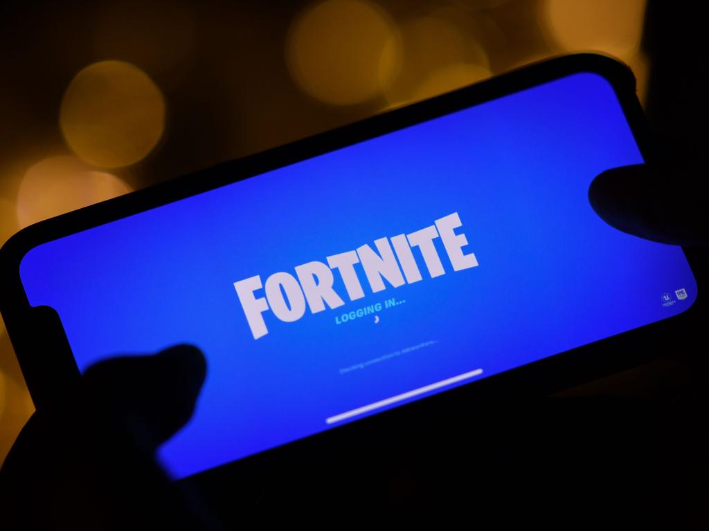 A Fortnite player logging in on their iPhone. Picture: Chris Delmas/AFP