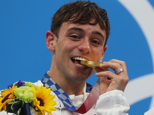 Tom Daley has crafted his gold medal a cosy pouch to keep it from getting scratched. Picture: Clive Rose/Getty Images