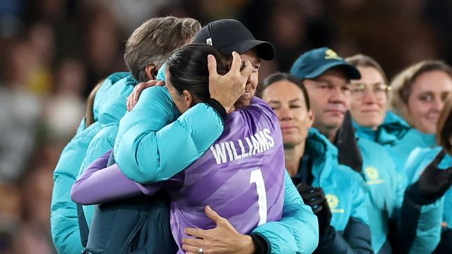 Lydia Williams is hugged by Matildas coach Tony Gustavsson as she leaves the field at Accor Stadium. Picture: Cameron Spencer/Getty Images