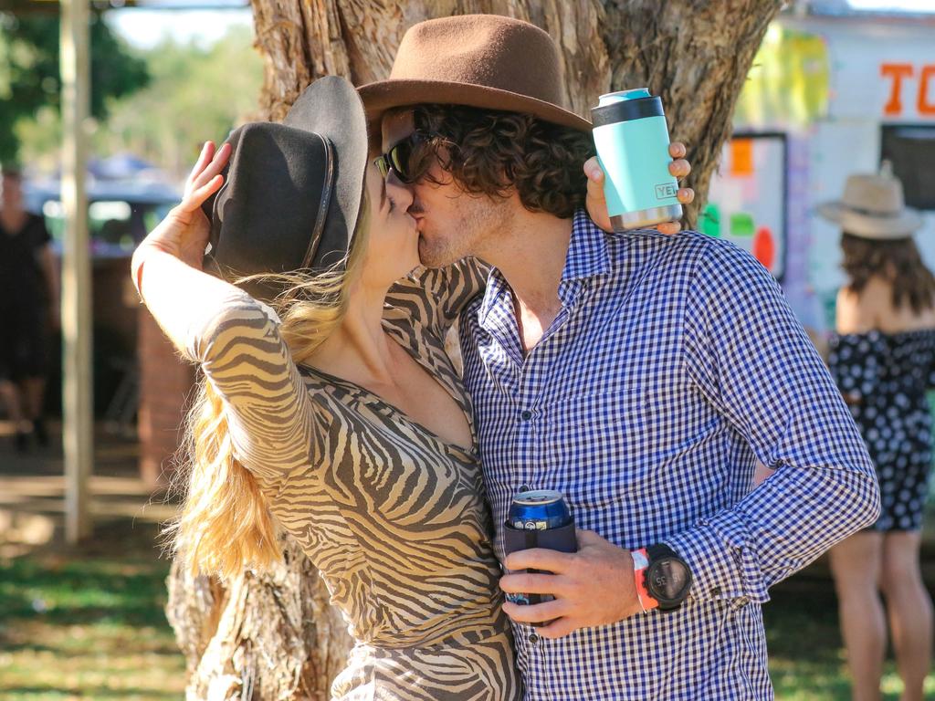 Bridee Peters and Mitchell Coptey celebrate their 6th anniversary  at the 2021 Adelaide River Races. Picture: Glenn Campbell.