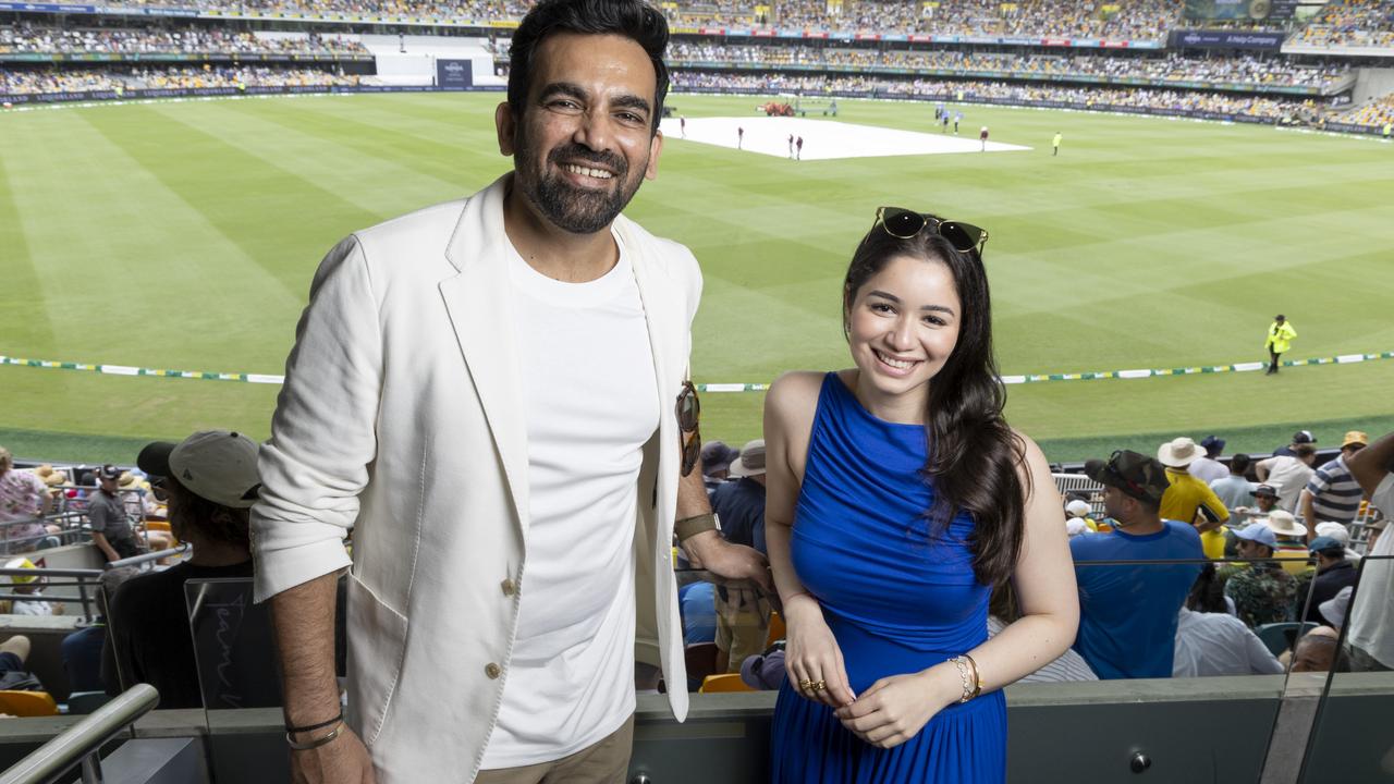 Zaheer Khan and Sara Tendulkar at the first day of the Gabba Test on Saturday. Picture: Richard Walker