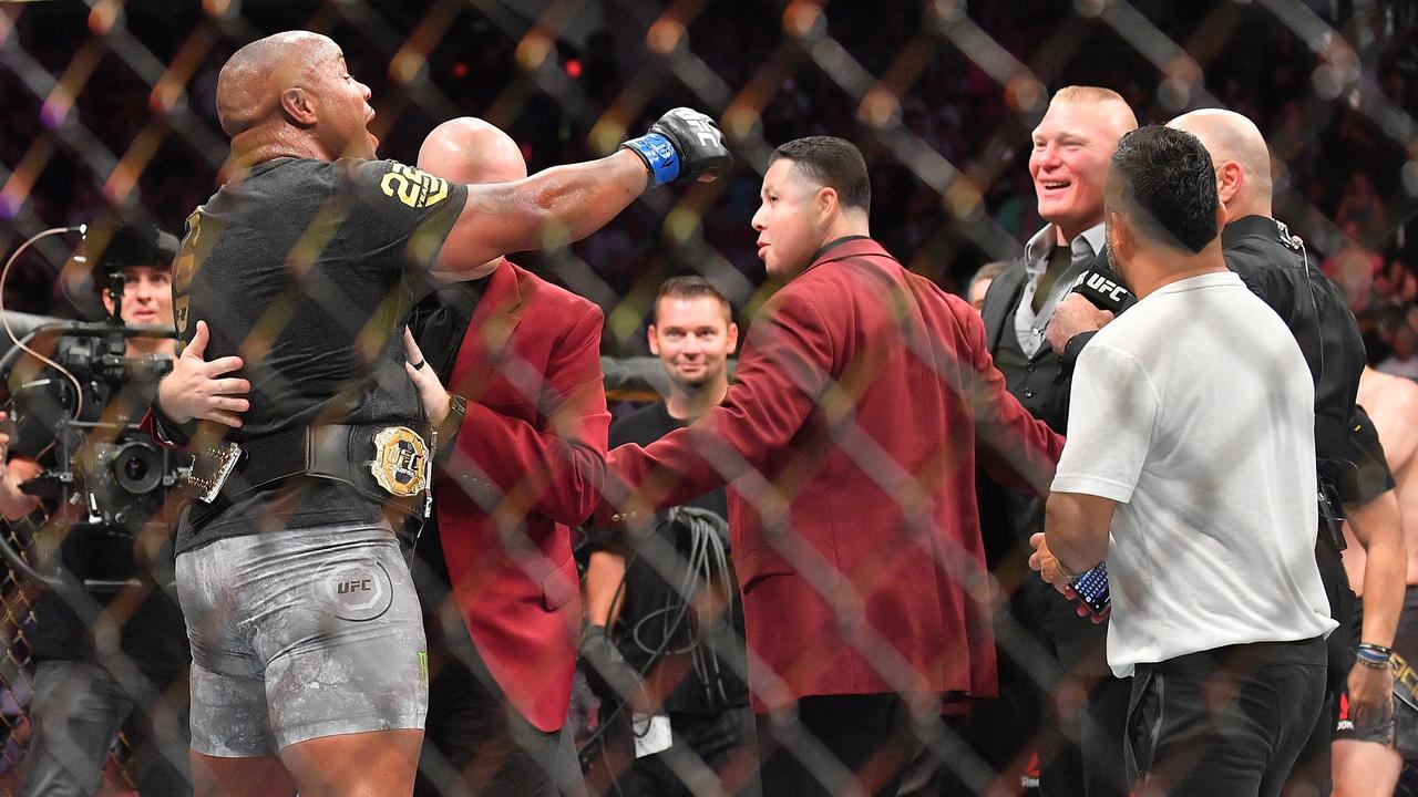 Daniel Cormier challenges Brock Lesnar after winning his heavyweight championship fight against Stipe Miocic in July.