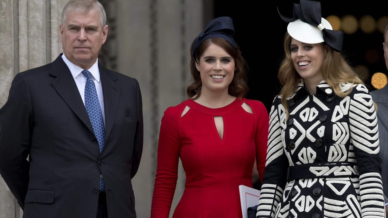 Prince Andrew, Princess Eugenie of York and Princess Beatrice of York in 2016. Picture: Justin Tallis / AFP