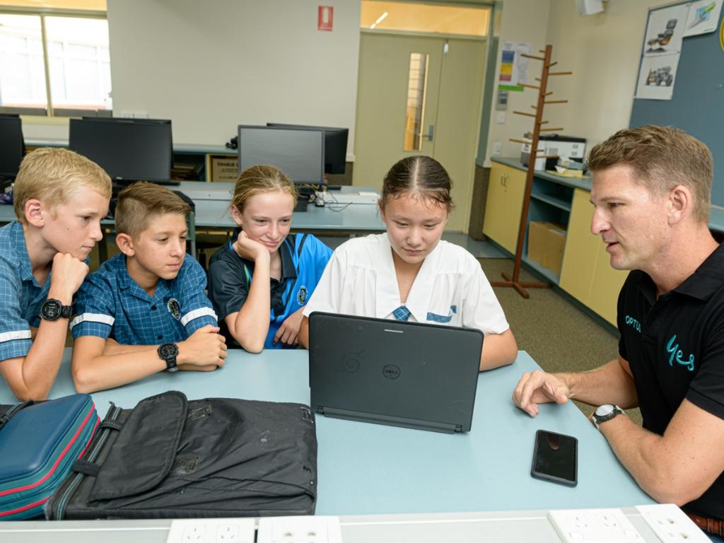 Resources will include digital licences to ensure students have the basic skills and understanding to know the risks and dangers online. Pictured are students at Queensland’s Riverside Christian College learning about cyber safety from Optus’ Mungo O'Brien as part of an unrelated program. Picture: supplied