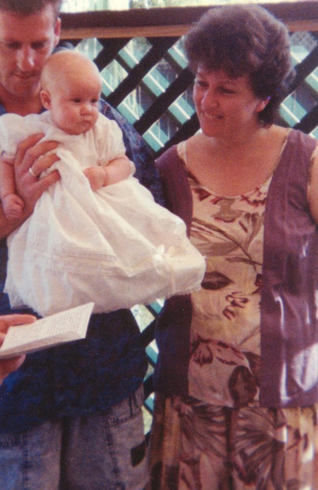 Folbigg, above with her then husband Craig and baby Sarah at the child’s naming ceremony, has a petition to the NSW Governor for a review of her case.