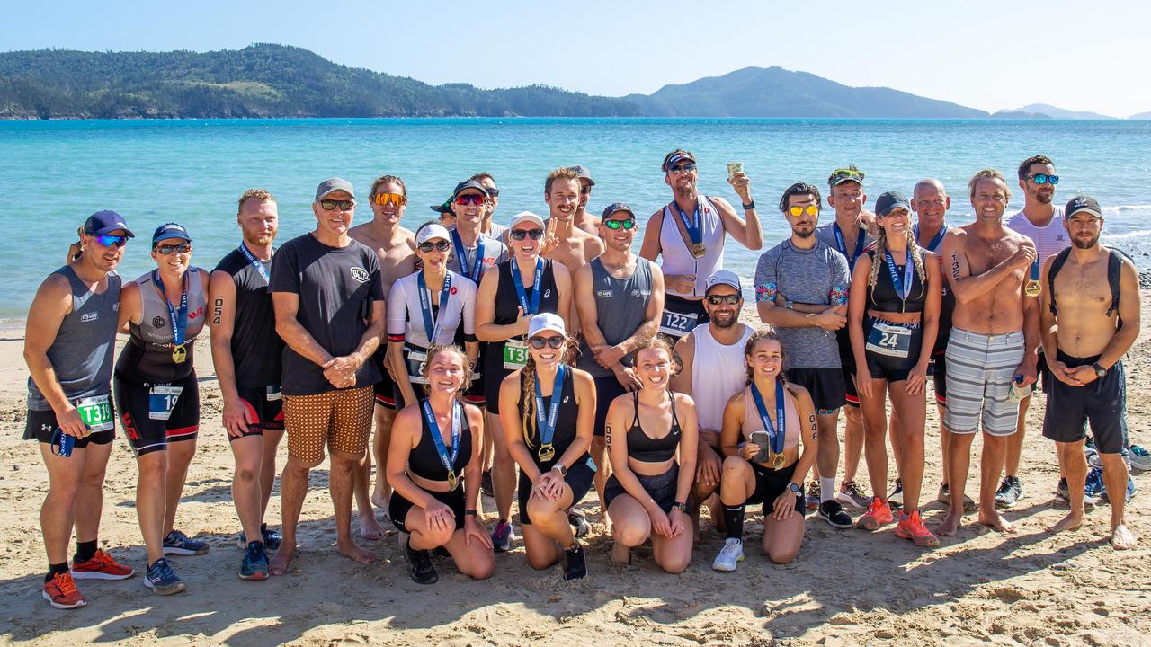 Members of the Whitsunday and Hamilton Island triathlon clubs celebrated completing the race. Picture: Supplied