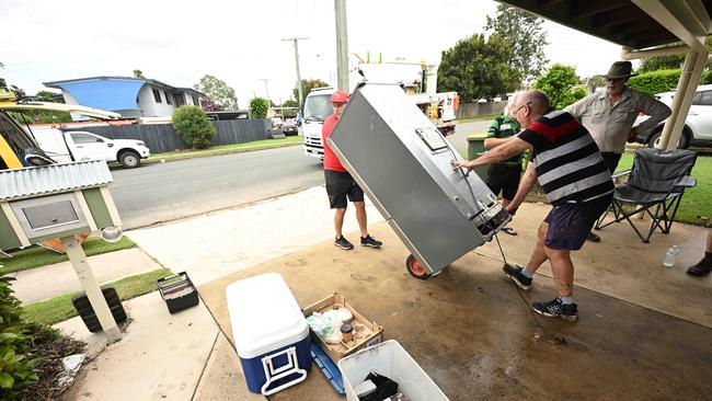 Neighbours helped each other with the flood clean-up.