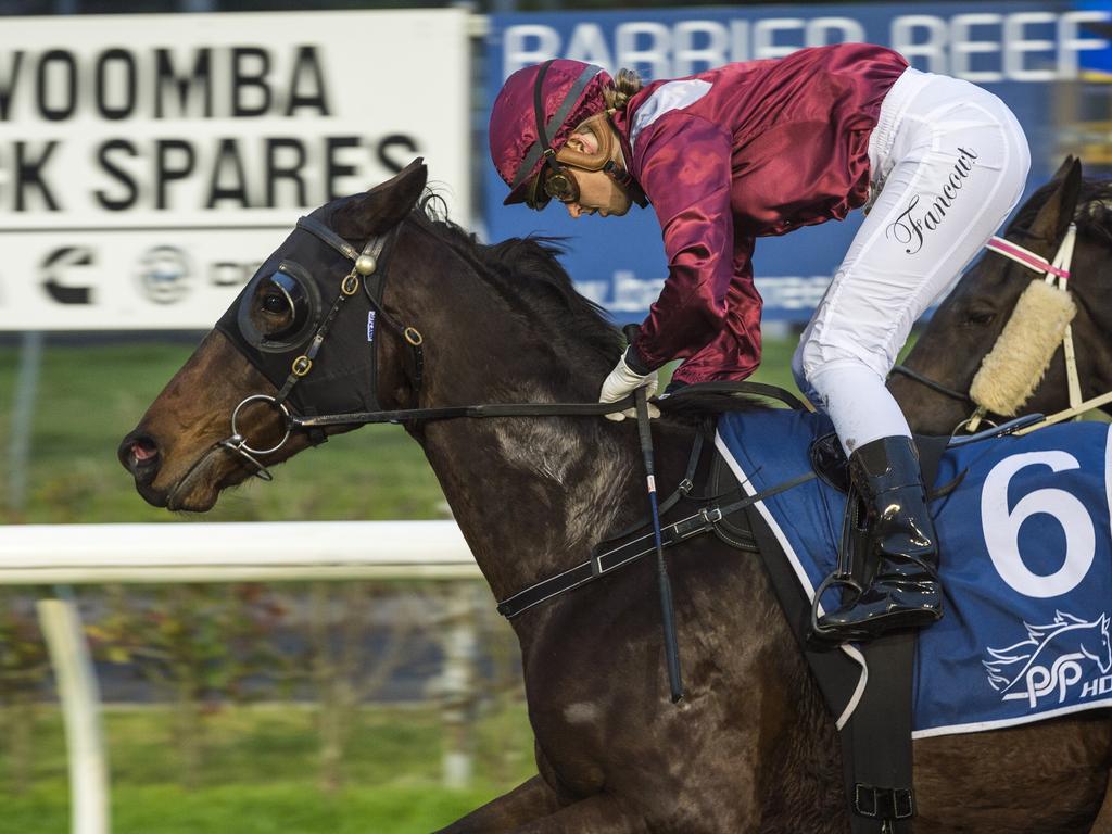 Jockey Alannah Fancourt guides Chevrons'n'rockers to win race one at Clifford Park Racecourse, Saturday, June 19, 2021. Picture: Kevin Farmer