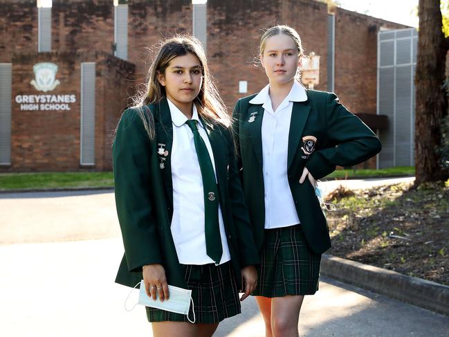 Year 12 Greystanes High School students (L-R) Luca Kent (18) and Henley Warner (17) have created a survey against the HSC exams going ahead with over 4000 responses. Overwhelmingly, 40% of students who responded said they are against getting the vaccine. Henley says more education targeted at students is needed to address the hesitancy, encourage vaccination rates and make it safer to go back to school. Jane Dempster/The Australian.