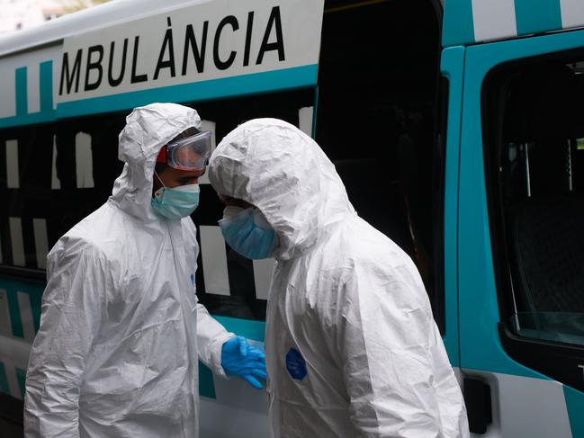 Medical workers in Barcelona. Numbers of coronavirus cases in Spain were starting to turn downwards. Picture: AFP