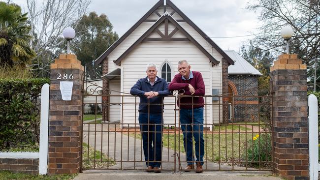 Peter Grace and Peter Sanders outside St Mary’s Anglican Church in Armidale, NSW. Picture: Simon Scott