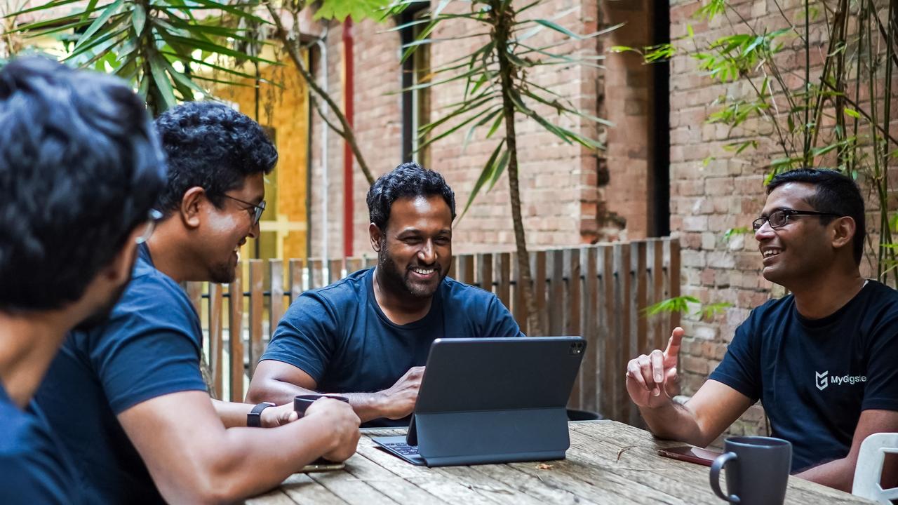 My Gigsters chief executive Benjemen Elengovan, centre, with his team. Picture: Supplied.