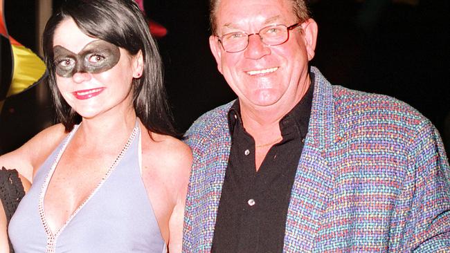 Cathy Jayne Pearce with her then-husband, the late Myles Pearce, at Le Carnivale Masquerade dinner at The Shores, West Beach in 2003.