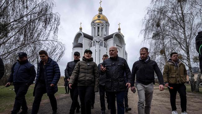 Ukraine's Prosecutor General Iryna Venediktova and Prosecutor of the International Criminal Court, Britain's Karim Khan, visit a mass grave in Bucha. Picture: AFP.