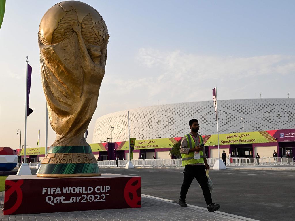 A man walks outside the Al-Thumama Stadium in Doha on November 8, 2022, ahead of the Qatar 2022 FIFA World Cup football tournament. (Photo by Kirill KUDRYAVTSEV / AFP)