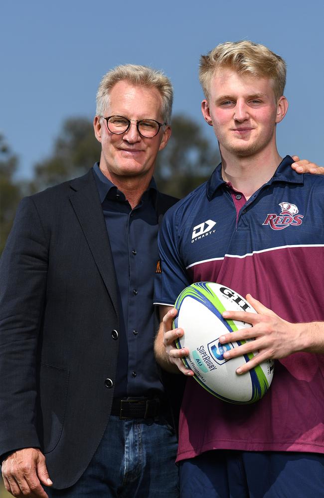 BRISBANE, AUSTRALIA - NewsWire Photos - SEPTEMBER 1, 2021. Queensland Reds new recruit Tom Lynagh and his father former Wallaby Michael Lynagh pose for photos at Ballymore in Brisbane. Picture: NCA NewsWire / Dan Peled