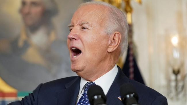 U.S. President Joe Biden reacts as he delivers remarks at the White House in Washington, U.S., February 8, 2024. REUTERS/Kevin Lamarque