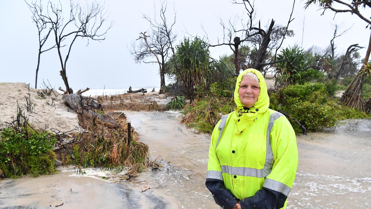 Angele Fludder inspects the tidal breakthrough at Bribie Island. Picture: Patrick Woods