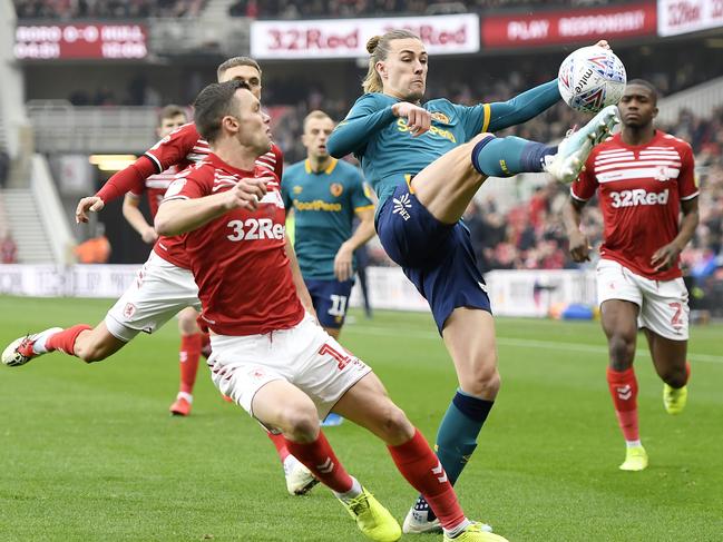 MIDDLESBROUGH, ENGLAND - NOVEMBER 24: Jackson Irvine of Hull City battles for possession with Jonny Howson of Middlesbrough during the Sky Bet Championship match between Middlesbrough and Hull City at Riverside Stadium on November 24, 2019 in Middlesbrough, England. (Photo by George Wood/Getty Images)