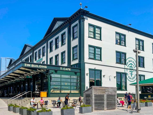 The Tin Building, built in 1907, was the Fulton Fish Market for years.