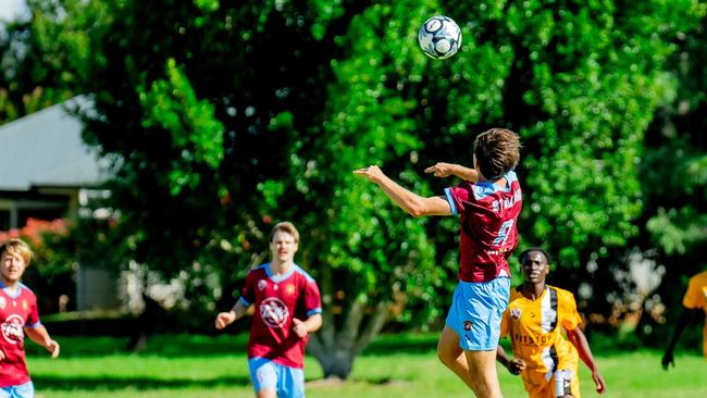 Bailey McDonald heads the ball for St Albans. Picture: DSL Photography