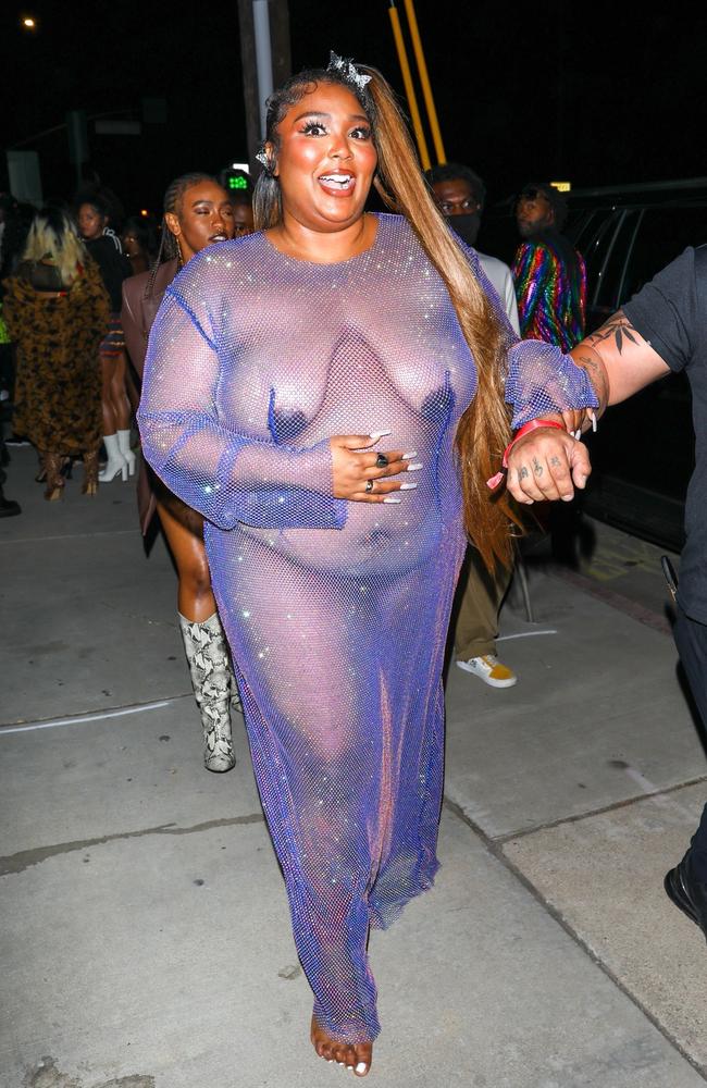 Lizzo goes to Cardi B's birthday party near-naked in sheer outfit