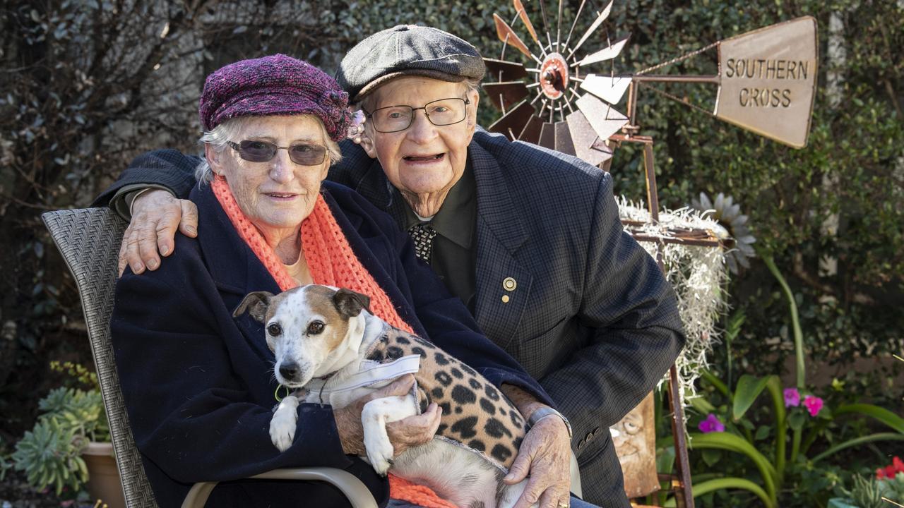 Toowoomba Care Services resident Mary Lester loved the visiting RSPCA dog Freckles so much she adopted him. She is pictured with her husband Vince Lester. Picture: Nev Madsen.