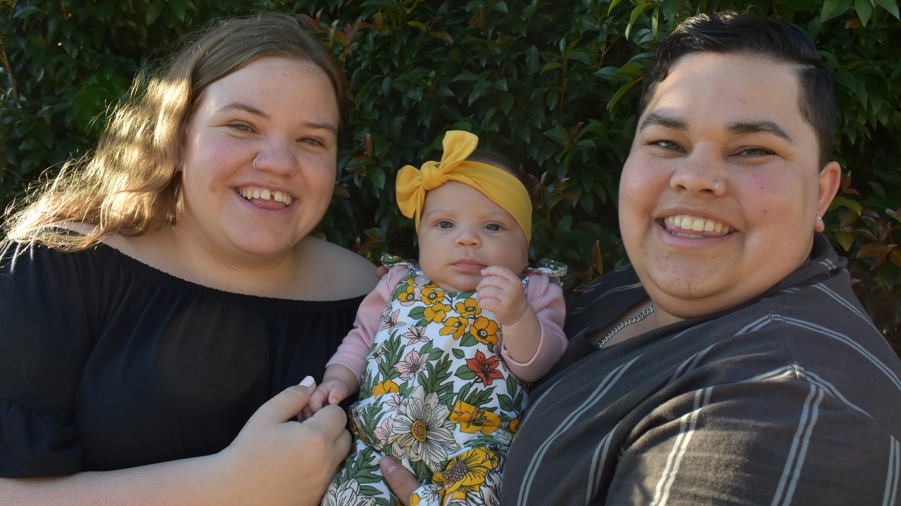 Arlo Lovett, three months, was voted as Mackay's cutest baby for 2020. The "miracle baby" is the daughter of Sammy Lovett, left, and Tenille Tonga, right.