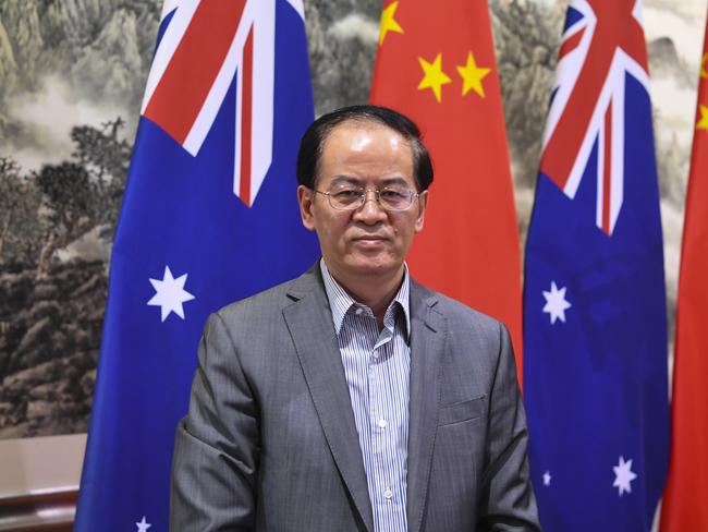 Chinese Ambassador to Australia Cheng Jingye poses for photographs after holding a press conference at the Ambassador's residence in Canberra, Thursday, December 19, 2019. (AAP Image/Lukas Coch) NO ARCHIVING