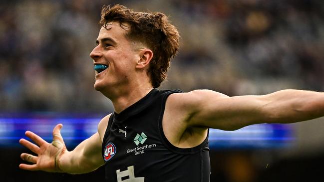 PERTH, AUSTRALIA - AUG 18: Jaxon Binns of the Blues celebrates a goal during the 2024 AFL Round 23 match between the West Coast Eagles and the Carlton Blues at Optus Stadium on August 18, 2024 in Perth, Australia. (Photo by Daniel Carson/AFL Photos via Getty Images)