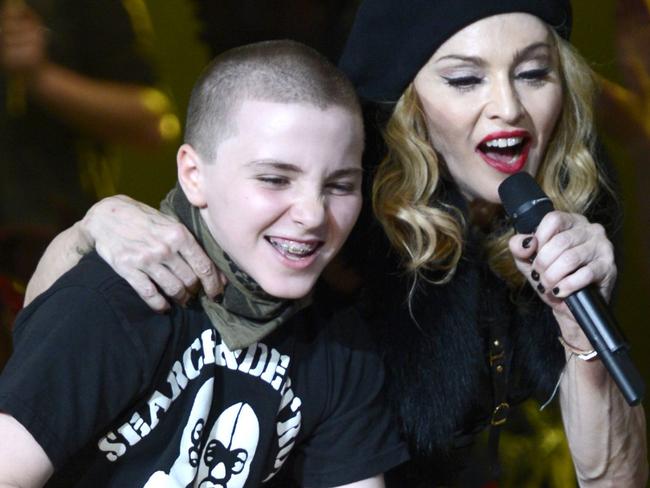 Happier times ... Rocco Ritchie and his mother Madonna perform on stage during her "MDNA" tour in 2012 in Tel Aviv, Israel. Picture: Supplied