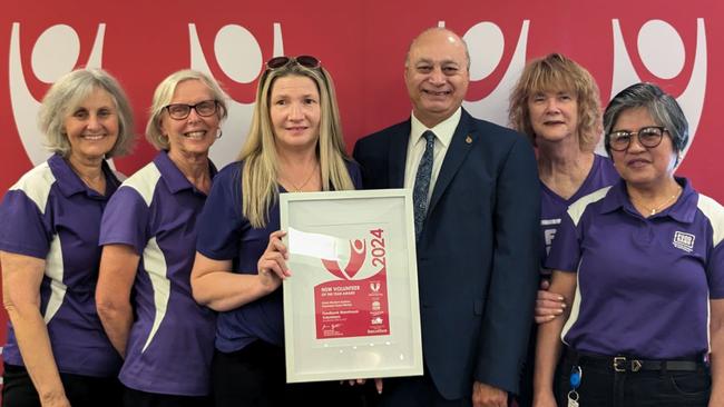 Mount Druitt MP Edmund Atalla with the Outer Western Sydney Volunteer Team of the Year, Foodbank warehouse volunteers. Picture: Supplied