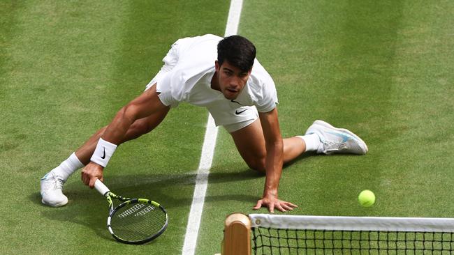 Carlos Alcaraz slides to play a forehand. Picture: Getty Images