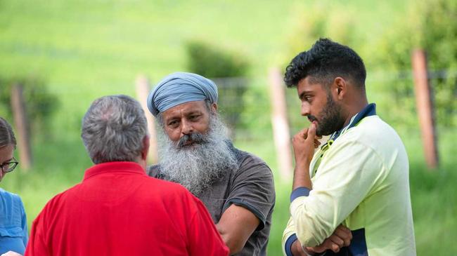 Farmer Iqbal Singh with his son. Picture: TREVOR VEALE