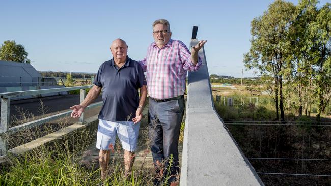 Coomera MP Michael Crandon and developer Norm Rix photographed when lobbying to get the bridge opened for residents. Picture: Jerad Williams.