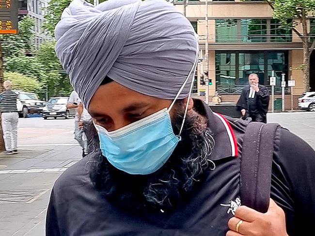 MELBOURNE, AUSTRALIA - NCA NewsWire Photos - 18 DECEMBER, 2023: Jatinder Singh (right) leaves the County Court of Victoria after pleading guilty to the theft of more than $6m mistakenly refunded from a cryptocurrency website Crypto.com in May 2021. Picture: NCA NewsWire /  Liam Beatty