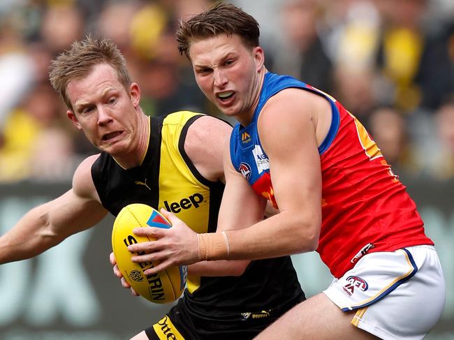 MELBOURNE, AUSTRALIA - AUGUST 25: Alex Witherden of the Lions and Jack Riewoldt in action during the 2019 AFL round 23 match between the Richmond Tigers and the Brisbane Lions at the Melbourne Cricket Ground on August 25, 2019 in Melbourne, Australia. (Photo by Michael Willson/AFL Photos via Getty Images)