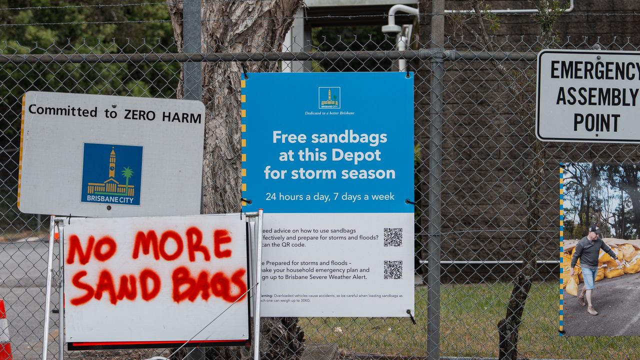 A sign reading 'No more sand bags' is hung outside a closed sandbag depot in the suburb of Zillmere on Thursday. Photo: Asanka Ratnayake.