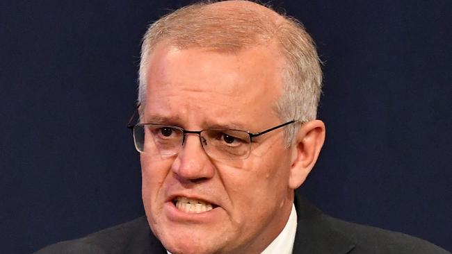 Australia's Prime Minister Scott Morrison concedes defeat in the national elections in Sydney on May 21, 2022. (Photo by Saeed KHAN / AFP)