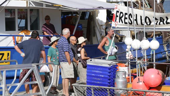 Crowds line up for the fresh seafood on offer at the Gold Coast Fisherman's Co-op. Picture: Luke Marsden.