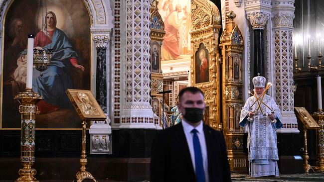 Russian Orthodox Patriarch Kirill, at right, attends a mass marking the Holiday of Annunciation in the Cathedral of Christ the Saviour in Moscow. Picture: Kirill Kudryavtsev/AFP